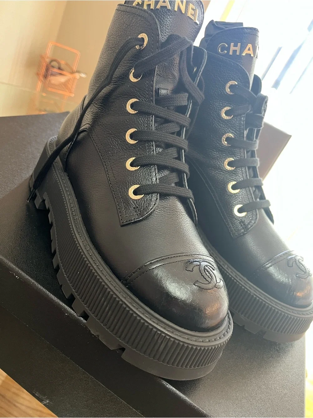CHANEL Black Leather Lace-Up Platform Ankle Boots with Gold Logo